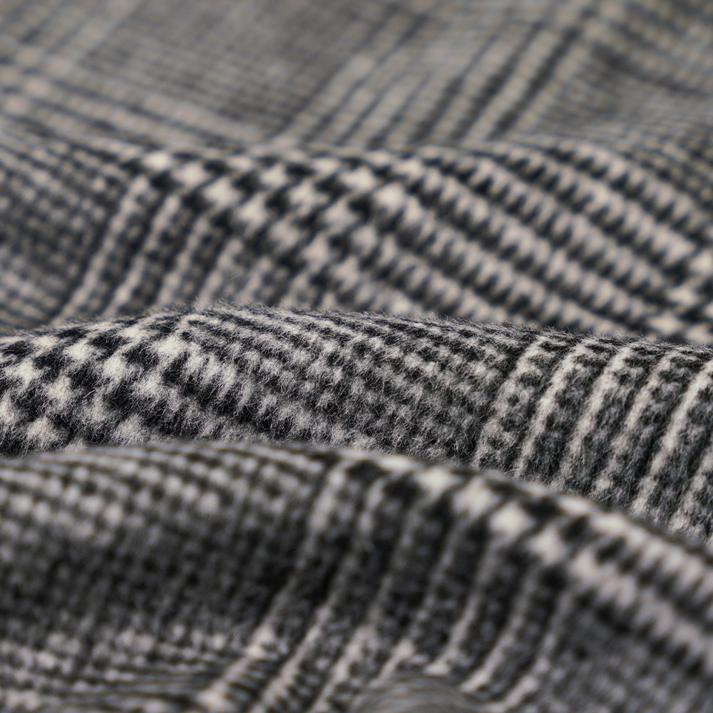 30 % Wolle, 60 % Polyester, 10 % andere Fasern, 610 g/m, schwarz und weiß, karierter einseitiger Überzugsstoff, ML-20001